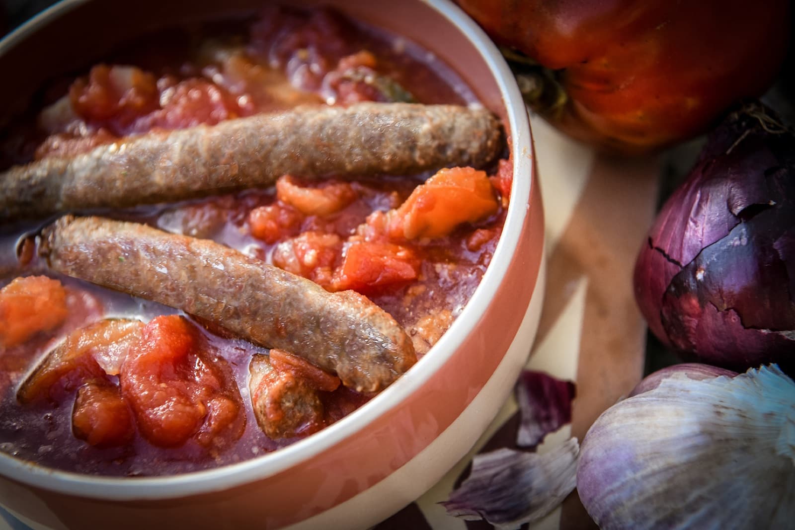 Saucisses de Mouton à la Piperade